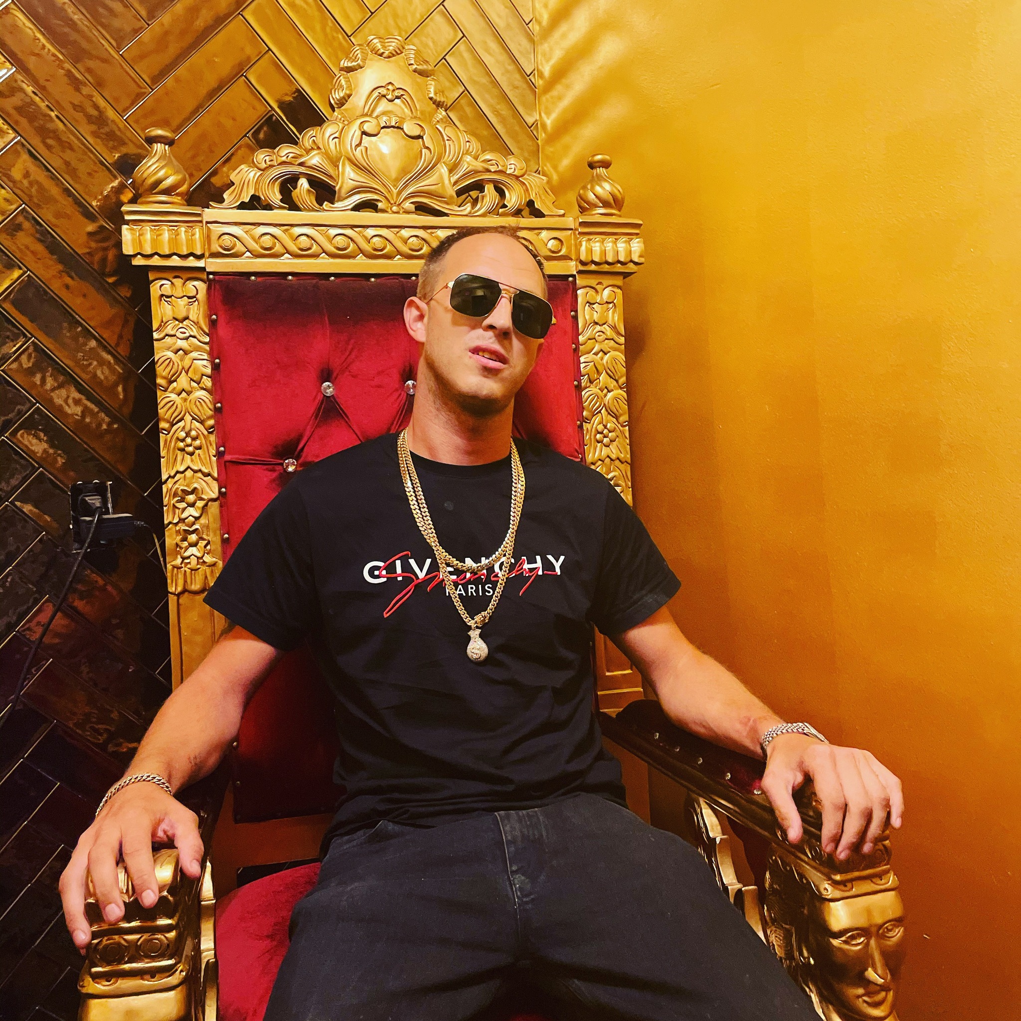 Benji Boyce in the king's chair